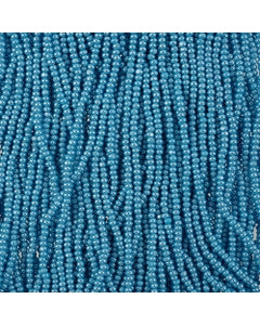 Czech Seed Bead 11/0 Cut Opaque Light Blue Luster Strung