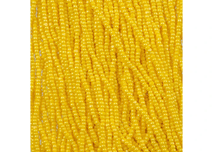Czech Seed Bead 11/0 Cut Opaque Yellow Luster Strung