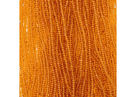 Czech Seed Bead 11/0 Cut Transparent Topaz Strung