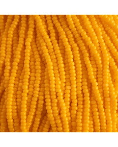 Czech Seed Beads 11/0 Cut Opaque Light Orange Strung